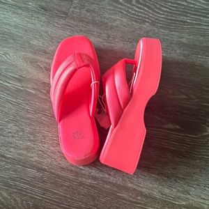 Hot pink platform sandals